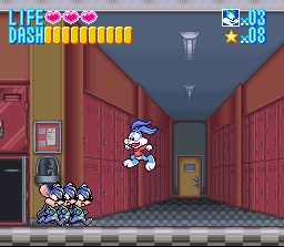 Buster salta no corredor da ACME Looniversity — SNES