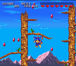 Sparkster se pendura num galho pela cauda — SNES