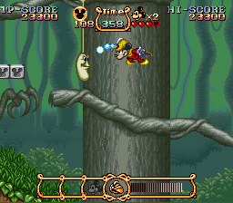Mickey usa o traje de mago para disparar — SNES