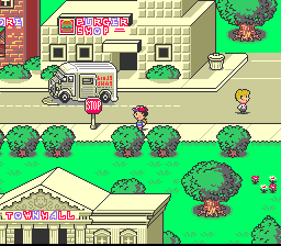 Ness nas ruas de uma cidade em EarthBound no SNES