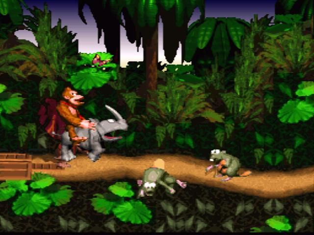 Donkey Kong e Diddy com Rambi na selva de Donkey Kong Country no SNES